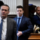 Kyle Rittenhouse, center, seen between attorneys Mark Richards, left, and Corey Chirafisi, right, as they enter a meeting in the Kenosha County Courthouse on Nov. 18, 2021.